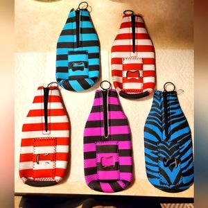 5 bottle Koozies with built in metal bottle opener.